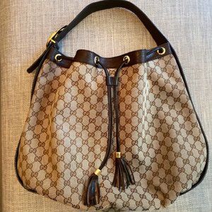 GUCCI Canvas Interlocking "GG" Gold Hardware Leather Drawstring Fringe Hobo Bag
